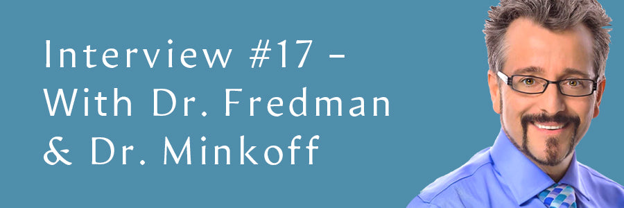 Dr. Friedman smiling on a light blue background.