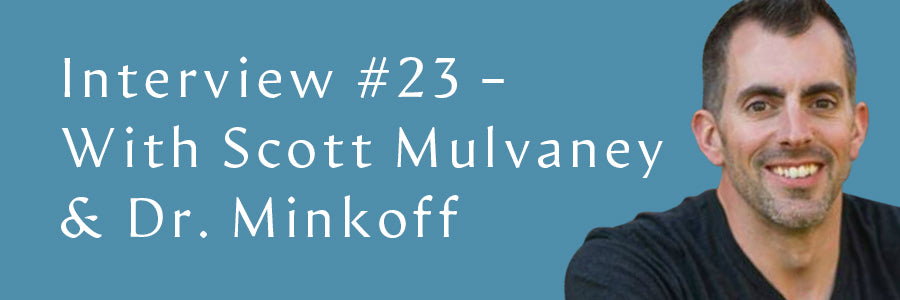 Scott Mulvaney smiling on a light blue background.