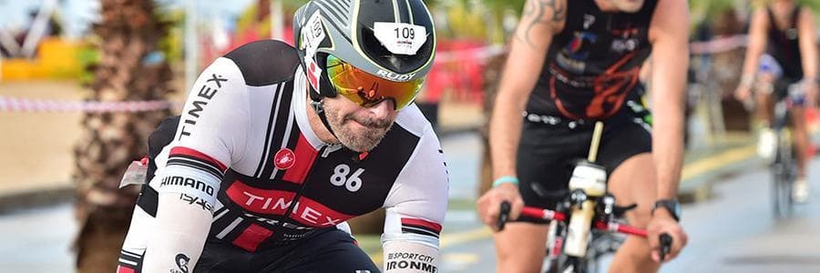 Man riding a bike in the ironman 