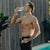 Dave Asprey drinking PerfectAmino outdoors with a pool and plants in the background